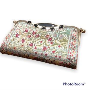 Vintage floral and gold print clutch with metal handle